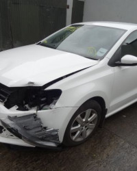 Damaged bumper on a white Volkswagen car