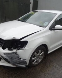Damaged bumper on a white Volkswagen car