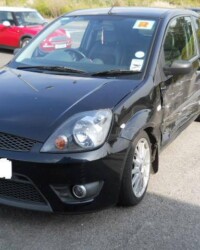 Damaged black ford